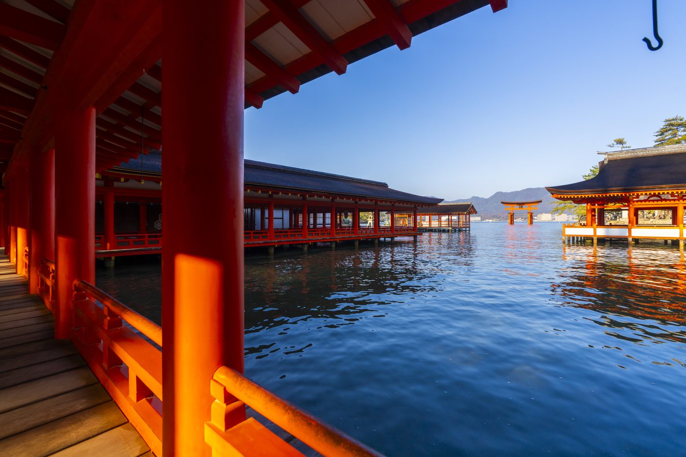 Vermilion pillars of Itsukushima Shrine above the water