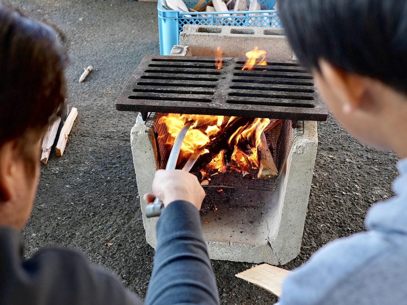 Flames beneath an iron grill
